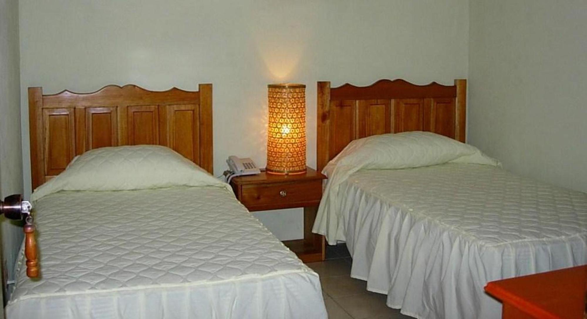 Nakum Hotel Flores Kamer foto